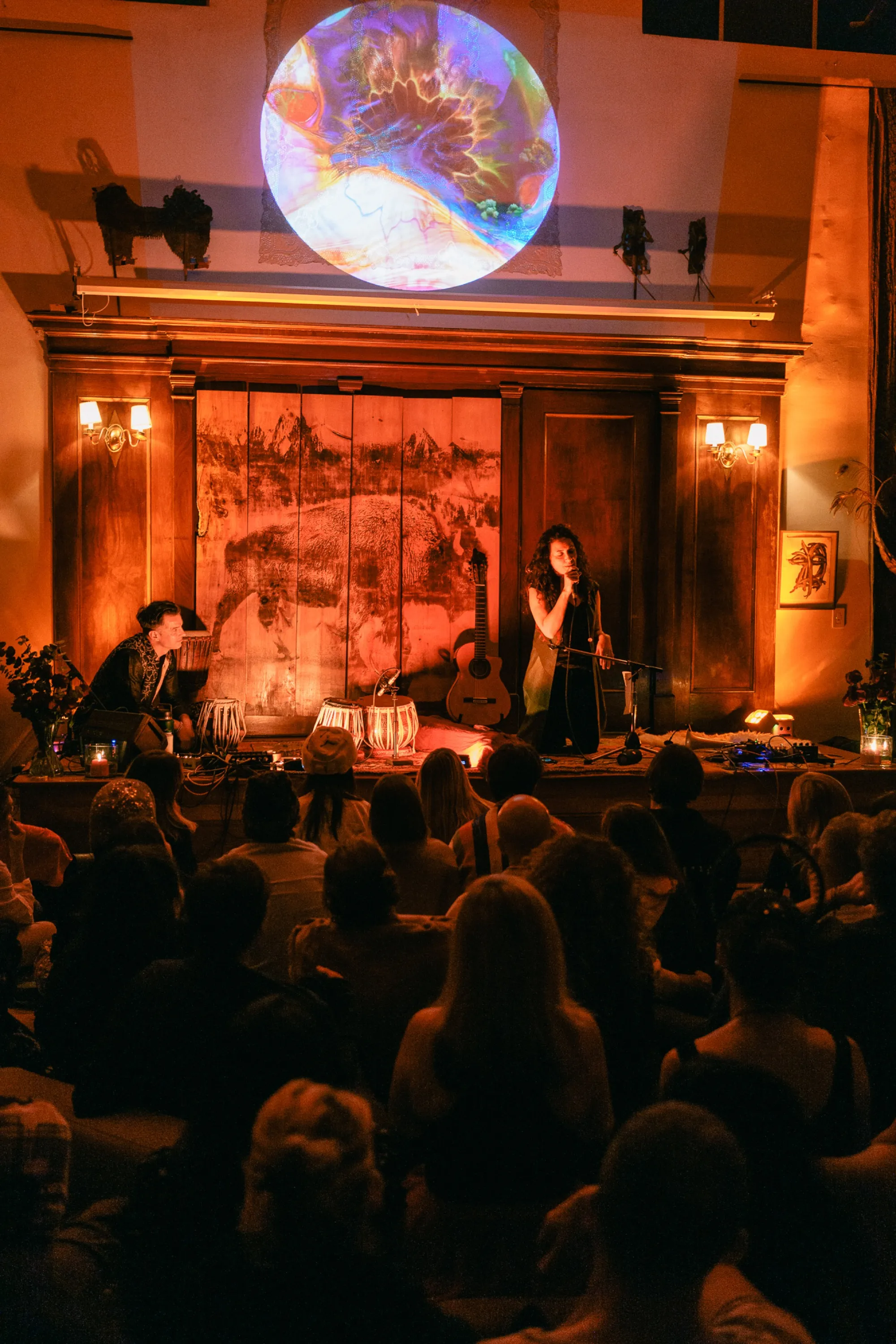 Global artist Benjamin Urbaez and DJ Dreeemy performing live at Viewcy in Harlem NYC with projected visuals and intimate audience