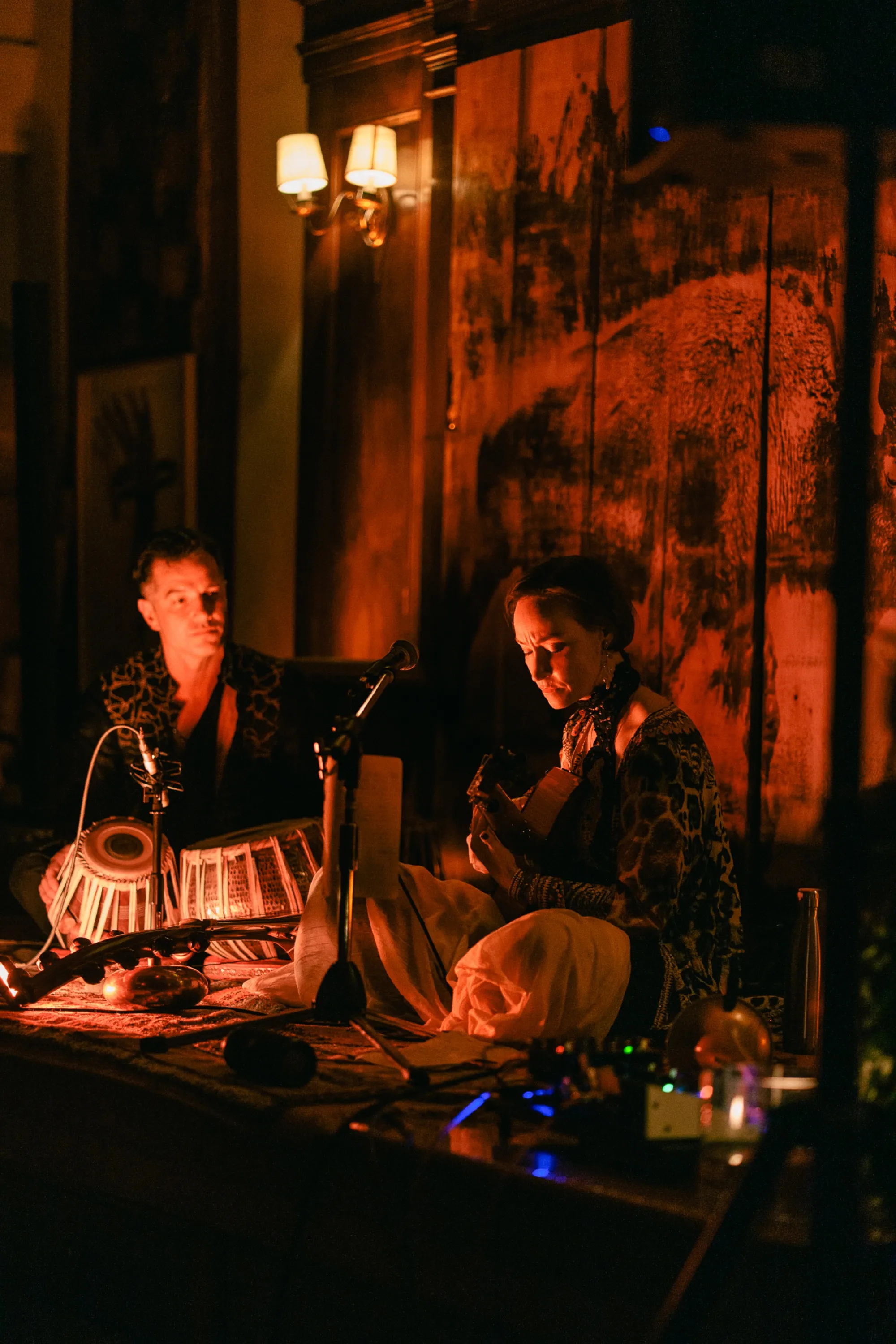 Global artist Benjamin Urbaez and DJ Dreeemy on stage at Viewcy Harlem with warm amber lighting and live electronic music setup