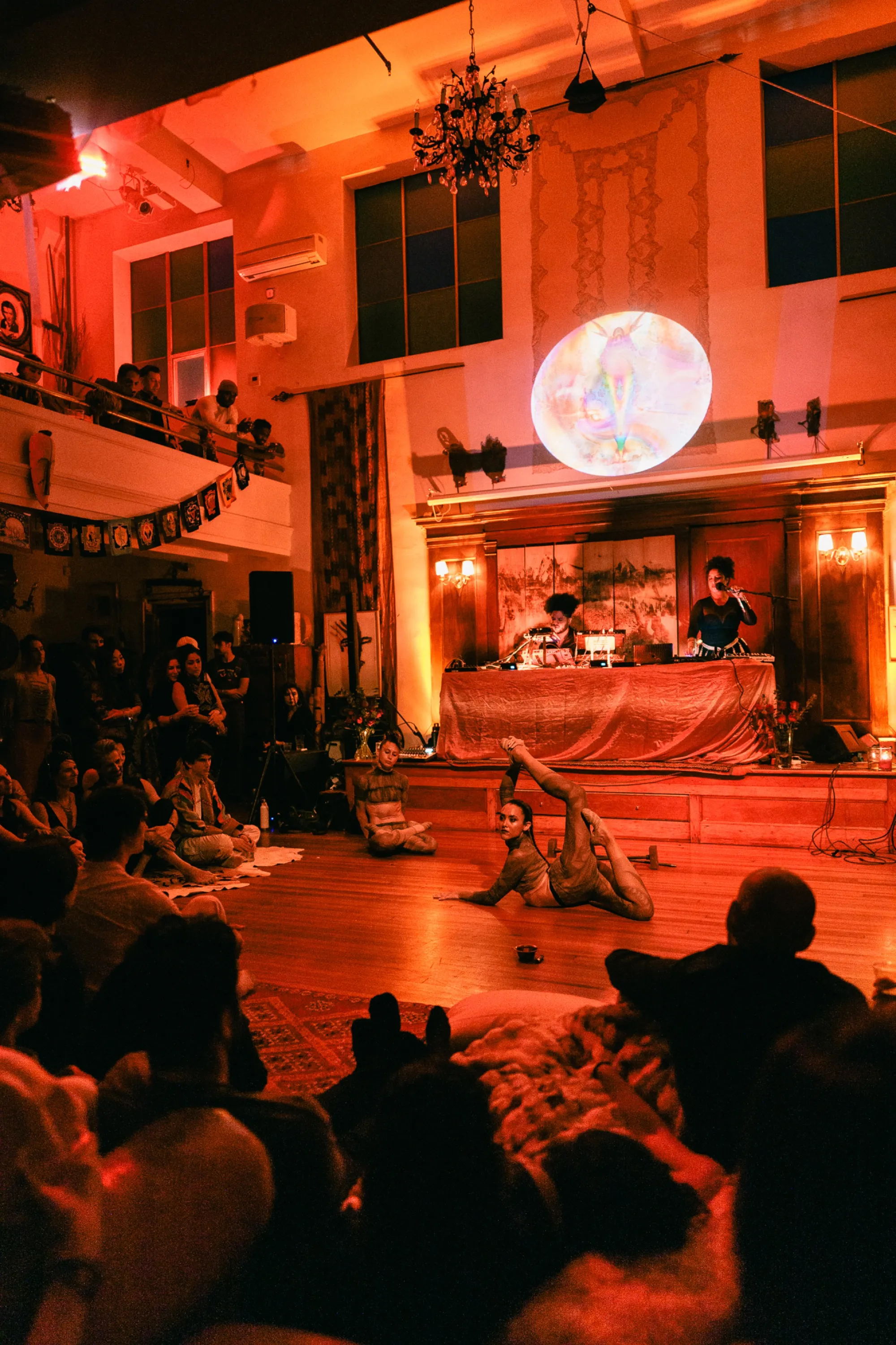 Global artist Benjamin Urbaez and DJ Dreeemy live set with looping equipment and warm stage lighting