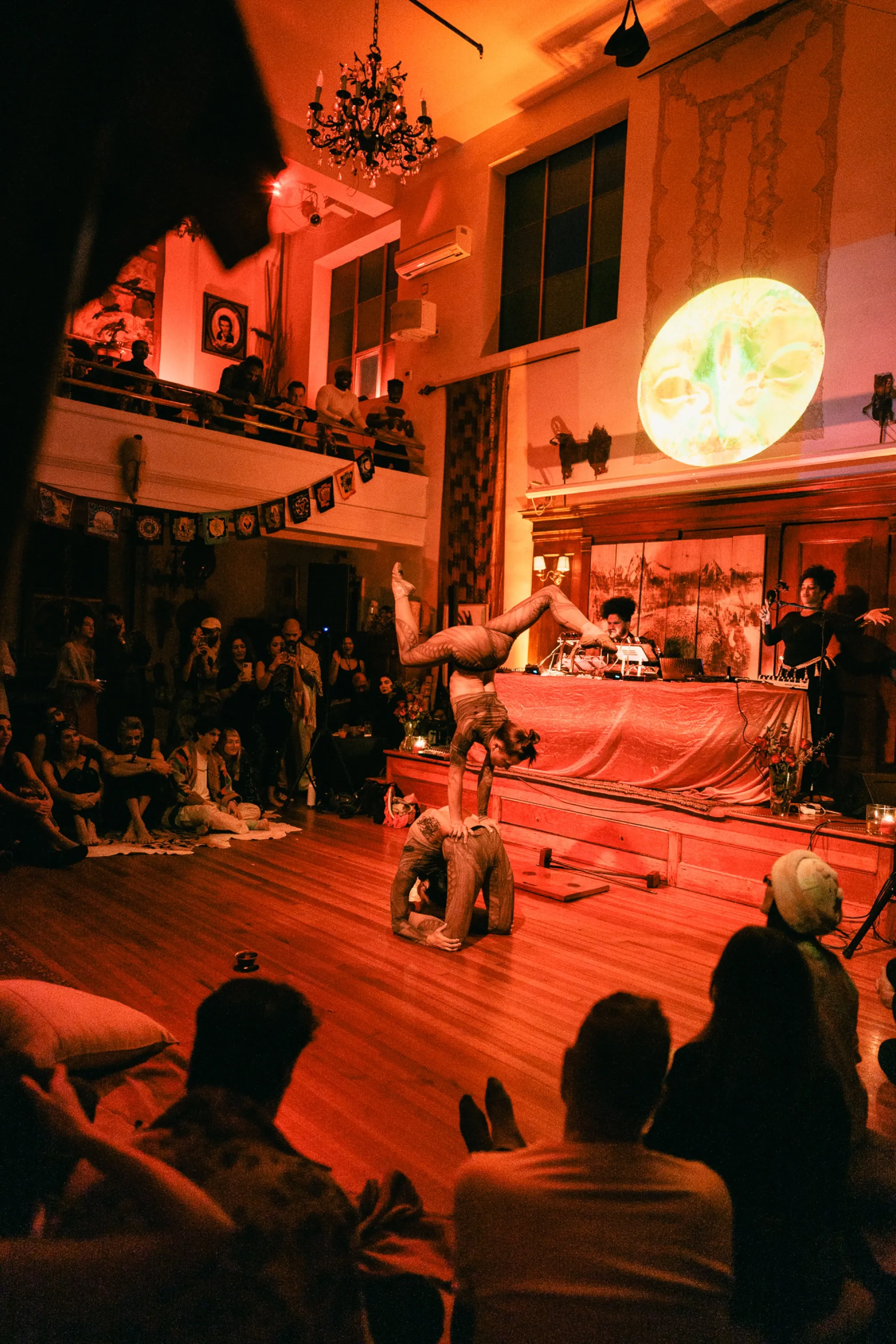 Global artist Benjamin Urbaez and DJ Dreeemy stage atmosphere at spiritual music ceremony in Harlem