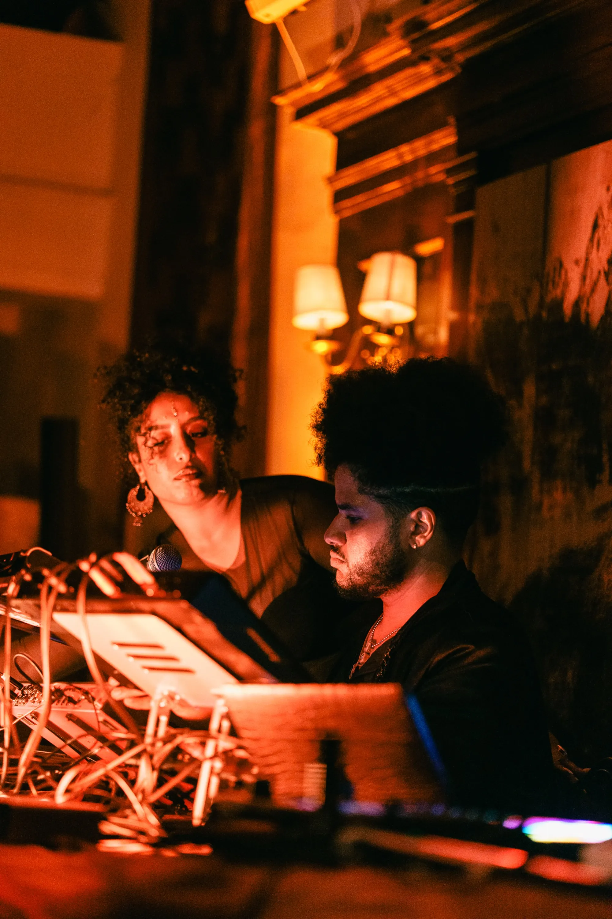 Global artist Benjamin Urbaez and DJ Dreeemy on stage performing spiritual soundscapes at Harlem event