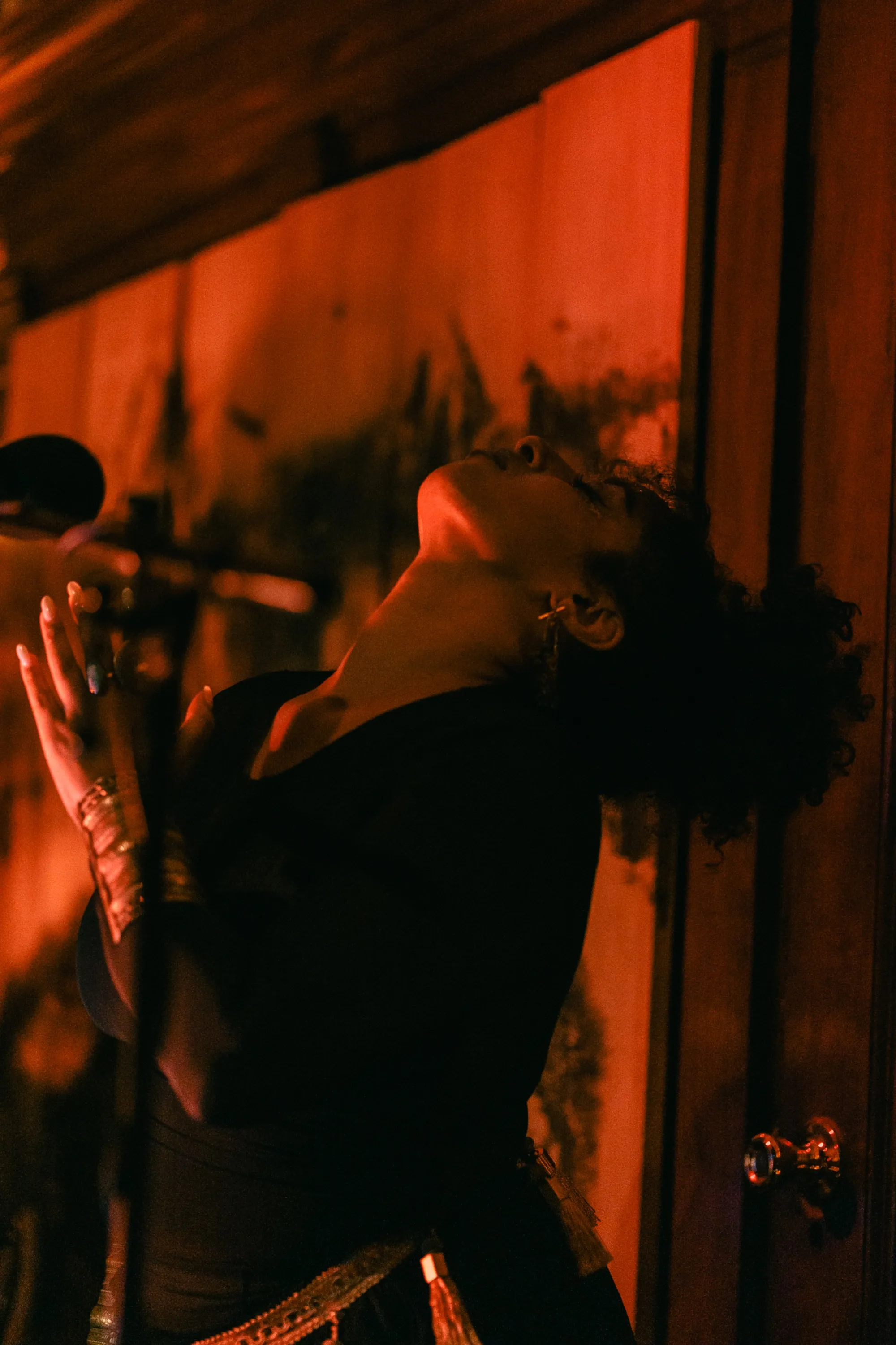 DJ Dreeemy performing expressively during Love Is Everything show at Viewcy Harlem with dramatic lighting