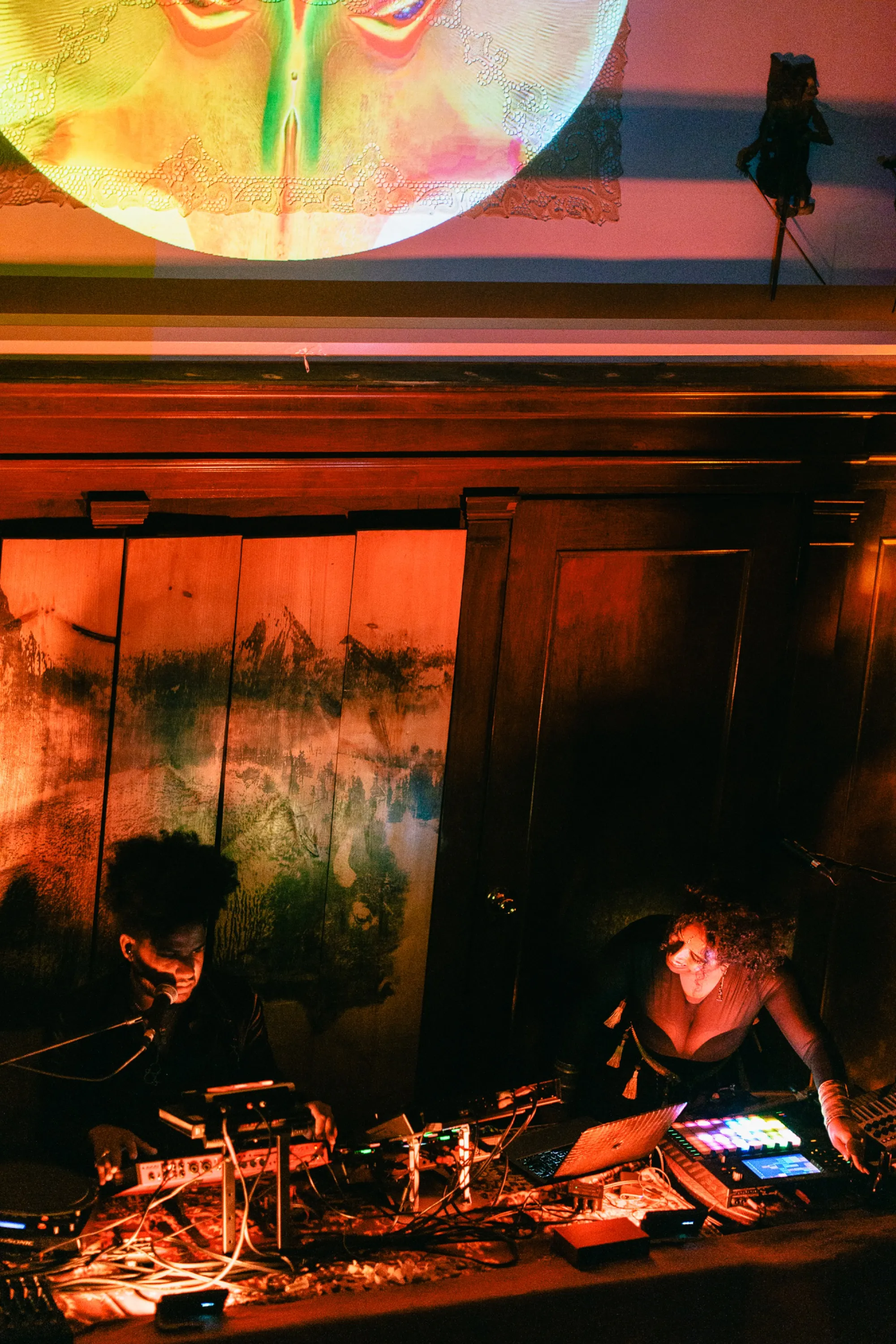 Global artist Benjamin Urbaez and DJ Dreeemy world performer creating live music at intimate Harlem gathering