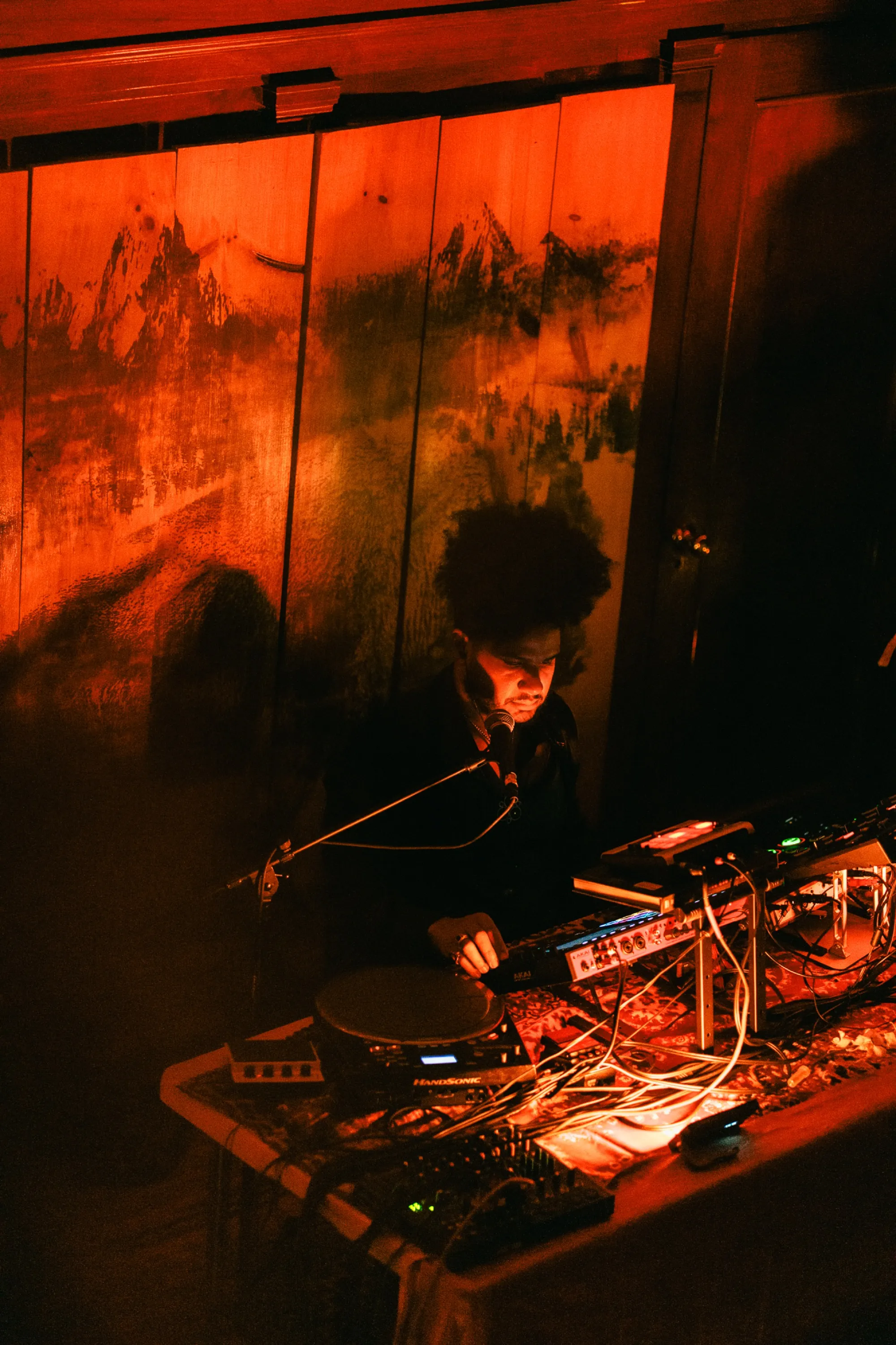 Global artist Benjamin Urbaez and DJ Dreeemy performing with electronic instruments at Harlem venue