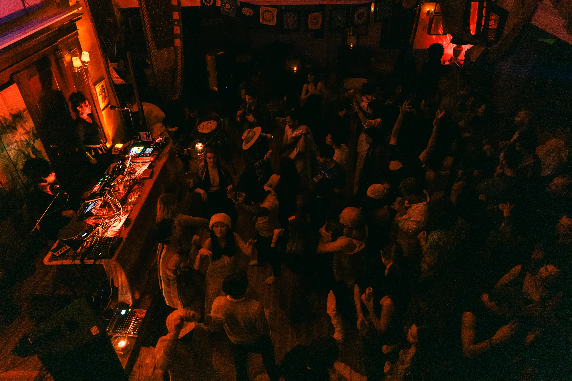 Global artist Benjamin Urbaez and DJ Dreeemy performing fusion music at intimate Harlem gathering