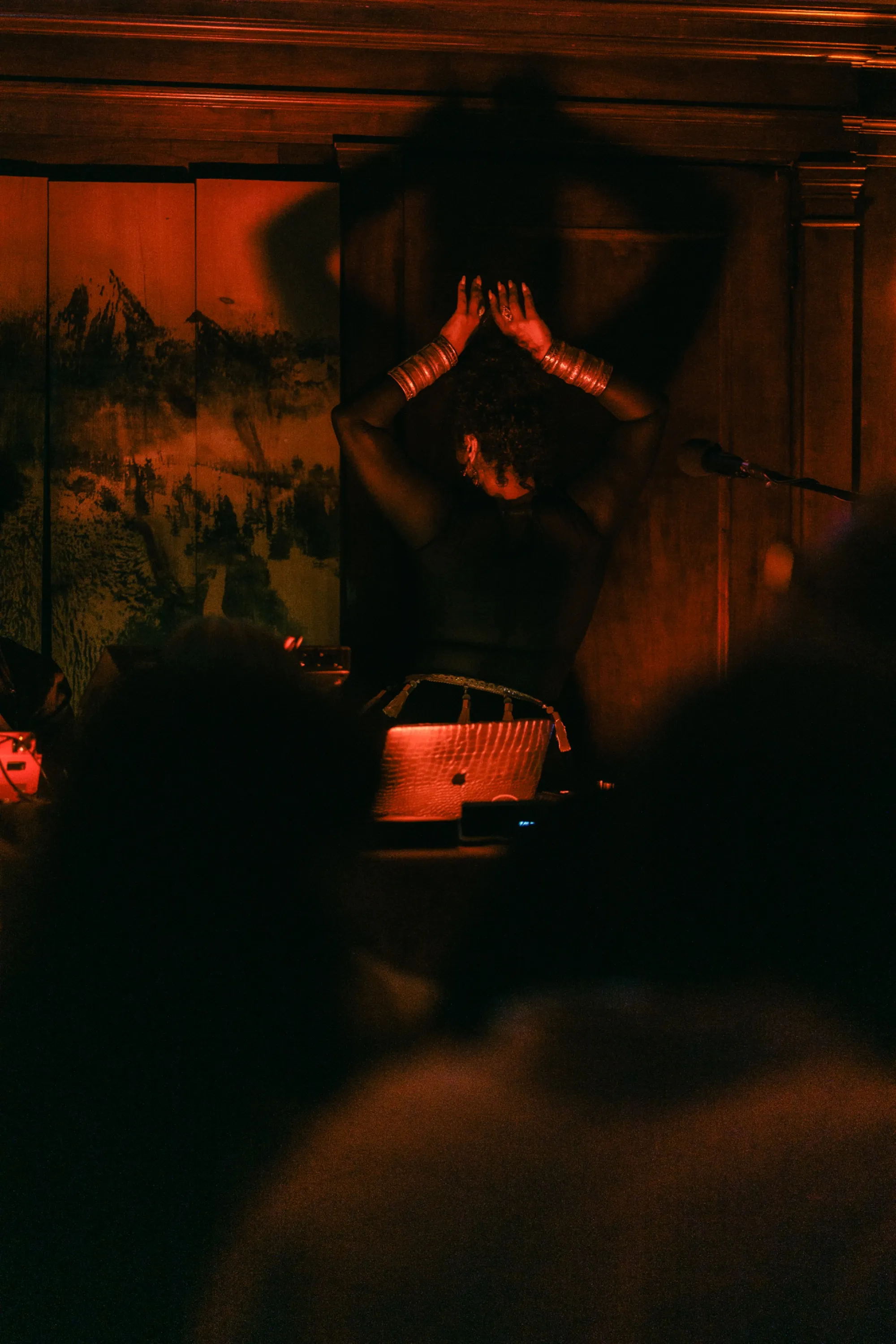 DJ Dreeemy performing with raised arms and bracelets during Love Is Everything show at Viewcy Harlem